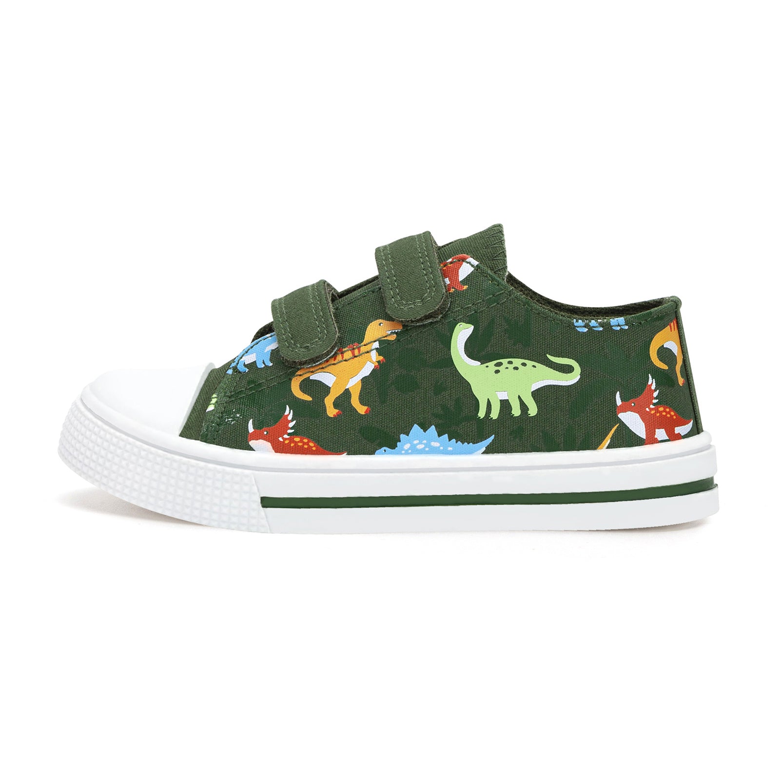 Green children's sneaker with dinosaur pattern on a white background
