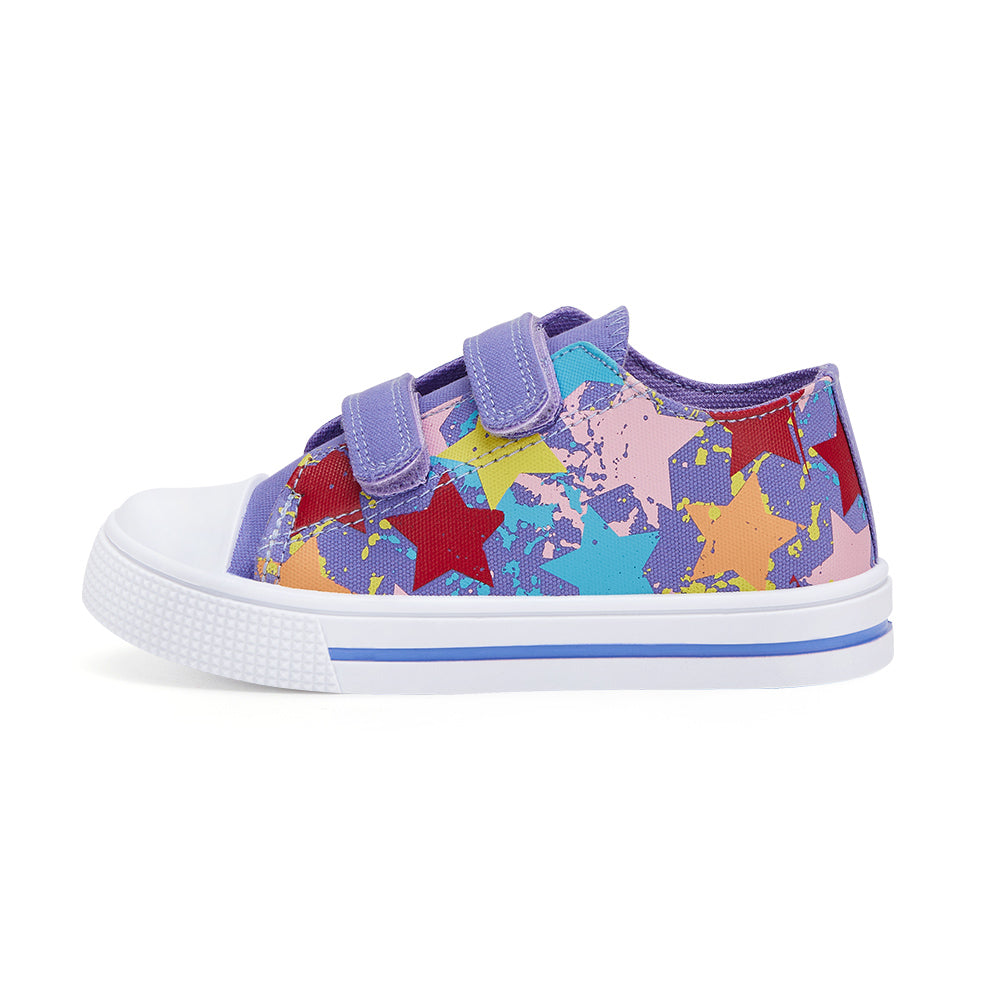 Colorful star-patterned sneaker with purple velcro straps on a white background