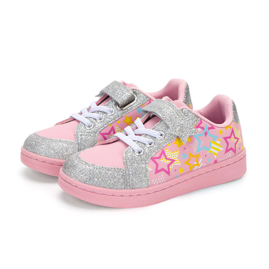 Pink sneakers with star patterns and silver glittery soles on a white background