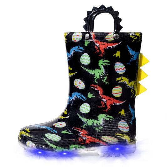 Children's rain boot with dinosaur pattern and LED lights on a white background