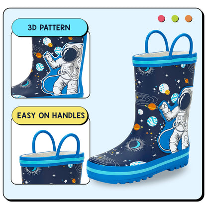 Children's rain boots with space-themed design and easy-on handles on a light blue background.