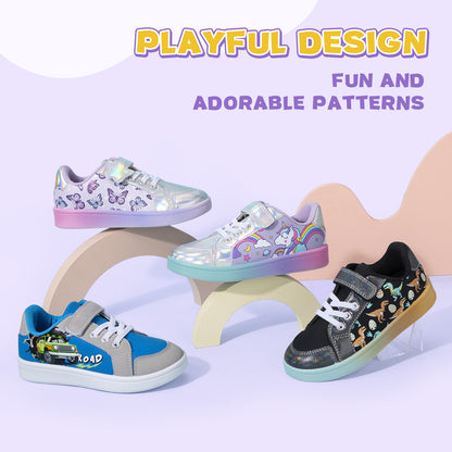 Four children's sneakers with playful designs on a white background