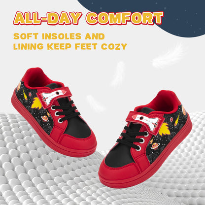 Red and black sneakers with space-themed design on a textured surface