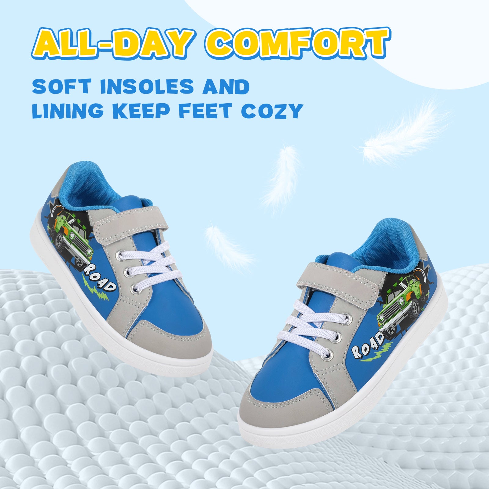 Blue and gray children's shoes with cartoon design on a textured surface and light blue background.