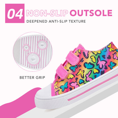 Colorful children's sneakers with butterfly pattern and pink accents, highlighting non-slip sole.