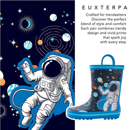 Children's rain boot with space-themed design featuring an astronaut, planets, and stars on a dark blue background.