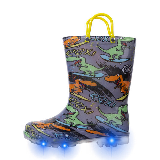 Children's rain boot with dinosaur pattern and LED lights on a white background